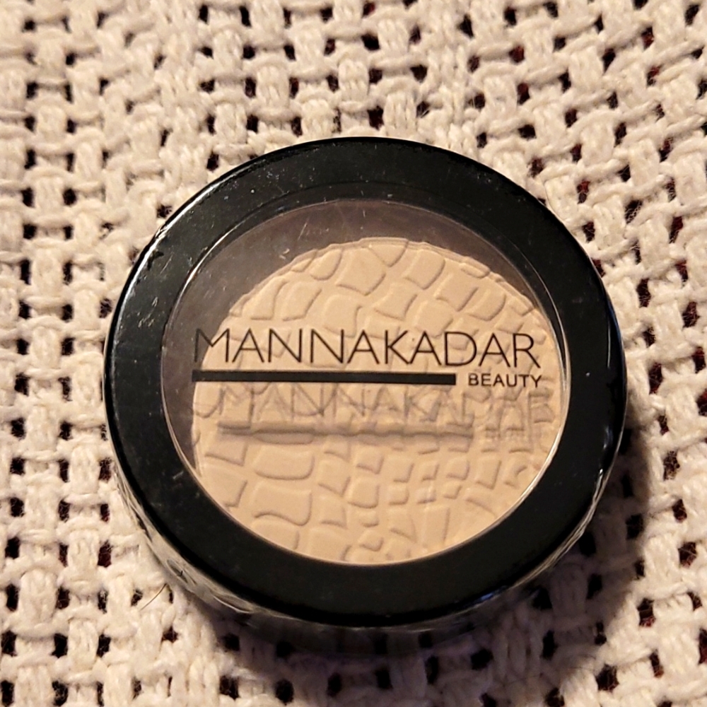Manna Kader perfecting powder